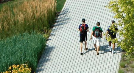 students walking on pervious pavers