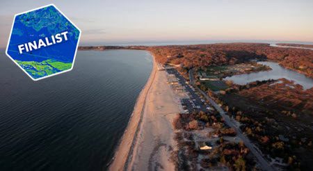 Aerial image of the Connecticut coastline showing beaches and forested area.